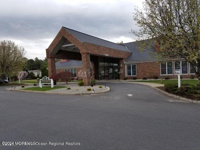 view of building exterior featuring driveway