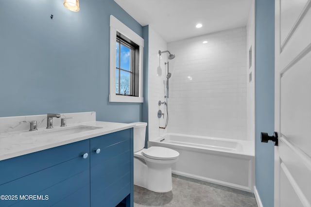 full bathroom with toilet, vanity, and tiled shower / bath combo