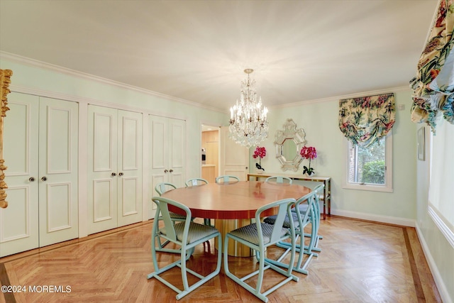 dining area with baseboards, ornamental molding, and a chandelier