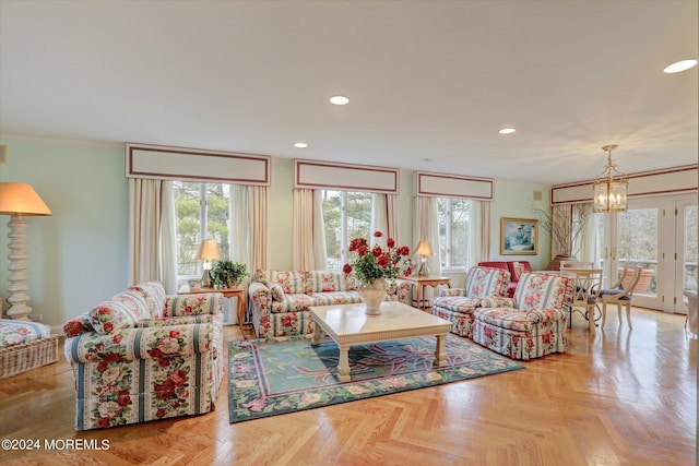 living area featuring a wealth of natural light, crown molding, and recessed lighting