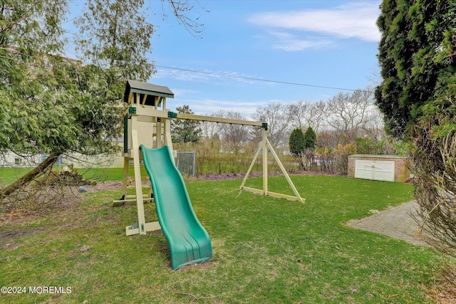 view of jungle gym with a lawn