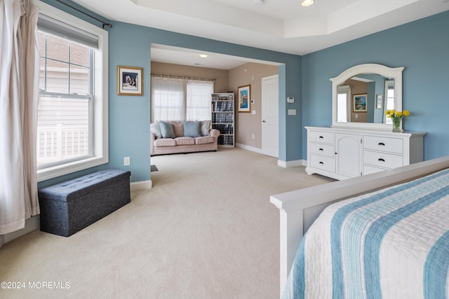 52 Seaview Ave, Long Branch, NJ 07740 - bedroom with light carpet, a raised ceiling, and baseboards