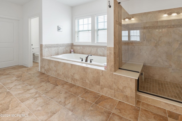 52 Seaview Ave, Long Branch, NJ 07740 - full bathroom with a garden tub, a tile shower, toilet, and tile patterned floors