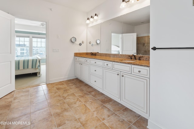 52 Seaview Ave, Long Branch, NJ 07740 - full bath with connected bathroom, double vanity, baseboards, and tile patterned flooring