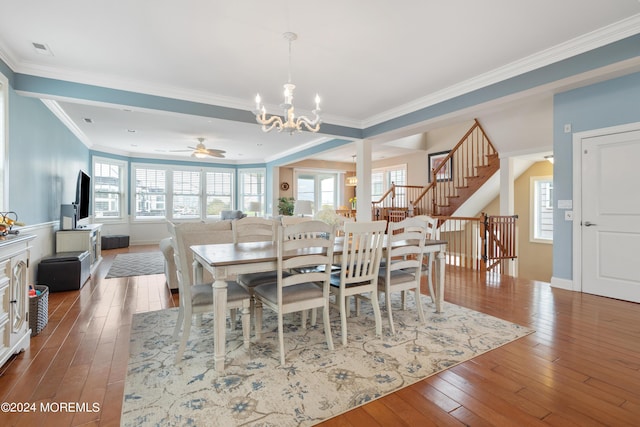 52 Seaview Ave, Long Branch, NJ 07740 - dining area with a chandelier, wood-type flooring, ornamental molding, stairs, and baseboards
