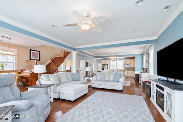 52 Seaview Ave, Long Branch, NJ 07740 - living area featuring a chandelier, dark wood-type flooring, ceiling fan, crown molding, and stairs