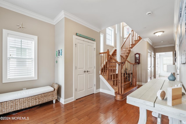 52 Seaview Ave, Long Branch, NJ 07740 - foyer featuring stairs, hardwood / wood-style floors, baseboards, and ornamental molding