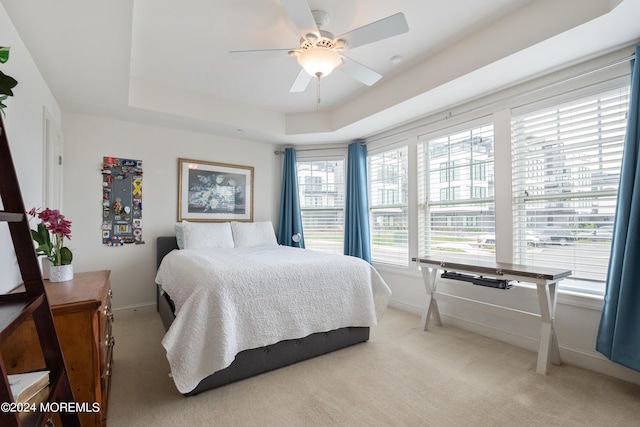 52 Seaview Ave, Long Branch, NJ 07740 - bedroom featuring light carpet, baseboards, a raised ceiling, and a ceiling fan