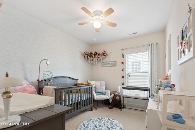 52 Seaview Ave, Long Branch, NJ 07740 - carpeted bedroom featuring a ceiling fan and a nursery area