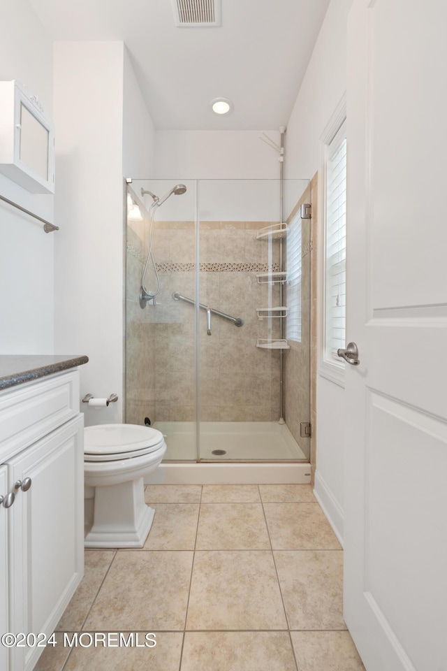 52 Seaview Ave, Long Branch, NJ 07740 - full bathroom featuring toilet, vanity, a shower stall, and tile patterned floors