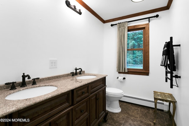 bathroom featuring toilet, crown molding, baseboard heating, and vanity