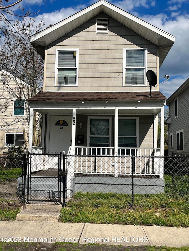 view of property with covered porch