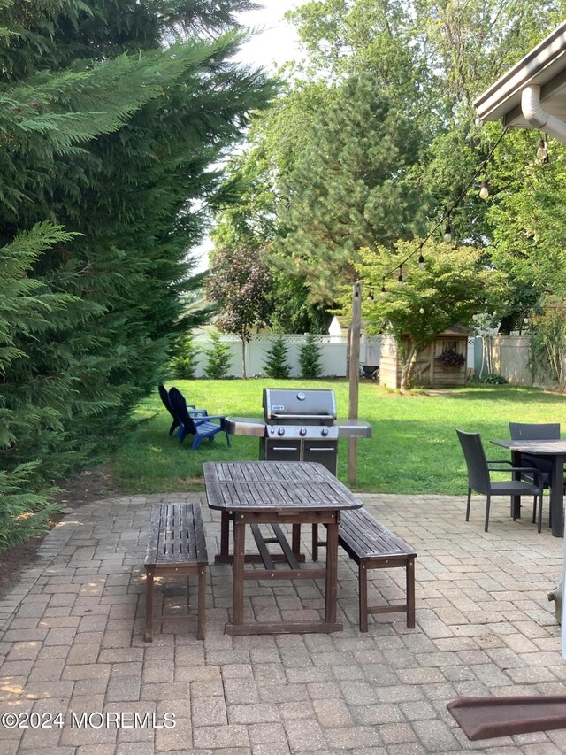 view of patio / terrace featuring a grill