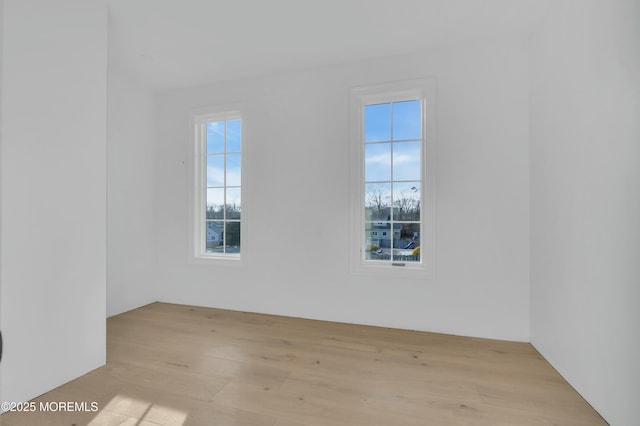 empty room featuring wood finished floors