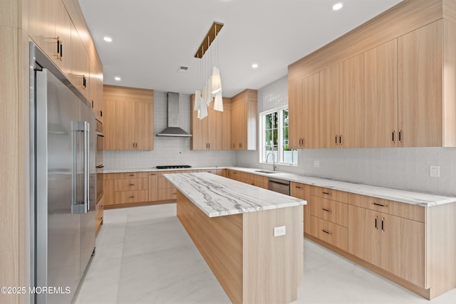 2 Deborah Pl, Oakhurst, NJ 07755 - kitchen with wall chimney exhaust hood, appliances with stainless steel finishes, modern cabinets, light brown cabinets, and a kitchen island