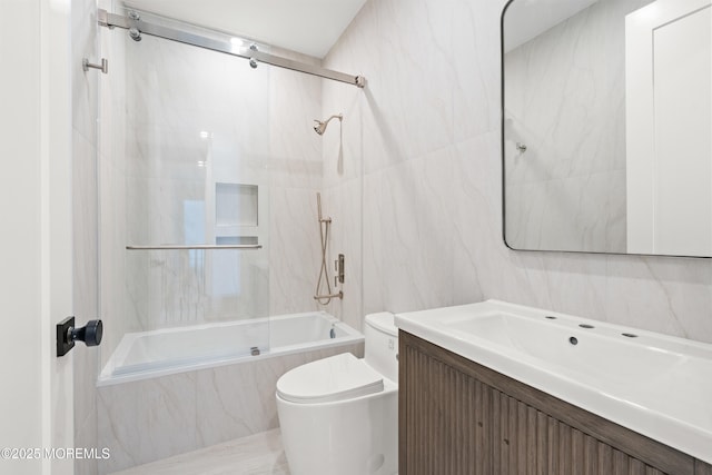 2 Deborah Pl, Oakhurst, NJ 07755 - full bathroom with a combined bath / shower with marble appearance, toilet, vanity, and tile walls