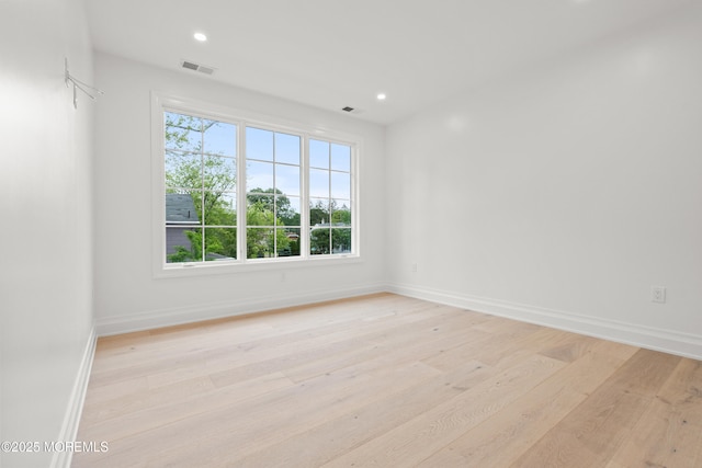 2 Deborah Pl, Oakhurst, NJ 07755 - unfurnished room featuring light wood finished floors, baseboards, and recessed lighting