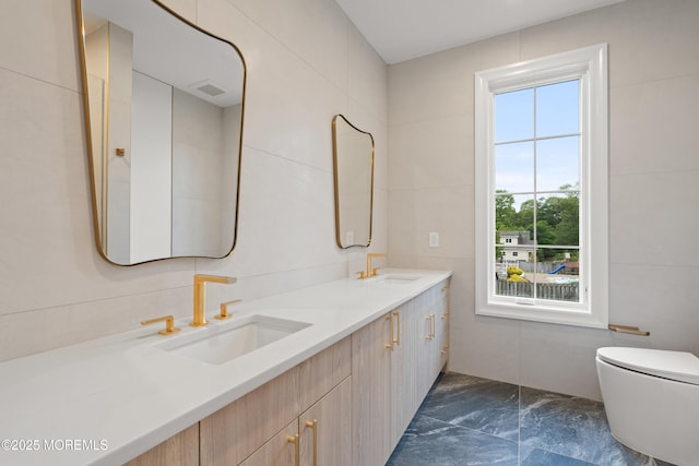 2 Deborah Pl, Oakhurst, NJ 07755 - full bath with double vanity, toilet, and tile walls