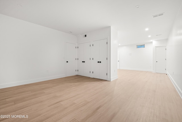 2 Deborah Pl, Oakhurst, NJ 07755 - empty room with light wood-style floors and baseboards