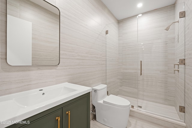 2 Deborah Pl, Oakhurst, NJ 07755 - bathroom with vanity, toilet, a shower stall, and tile walls