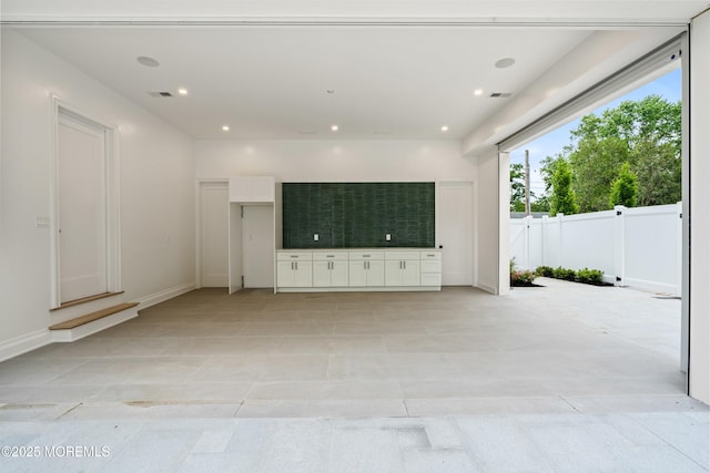 2 Deborah Pl, Oakhurst, NJ 07755 - unfurnished living room featuring light tile patterned flooring and recessed lighting