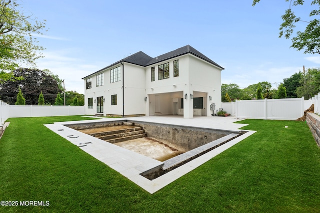 2 Deborah Pl, Oakhurst, NJ 07755 - back of property featuring a patio area and stucco siding