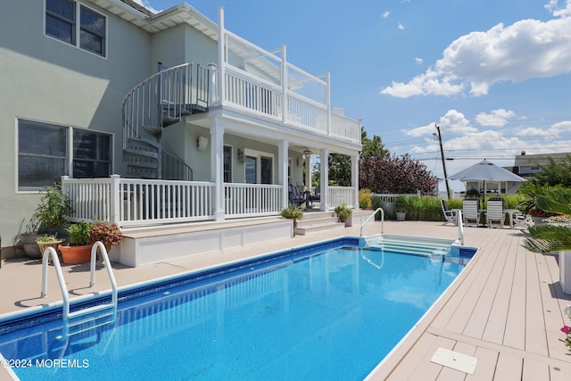 outdoor pool with a patio