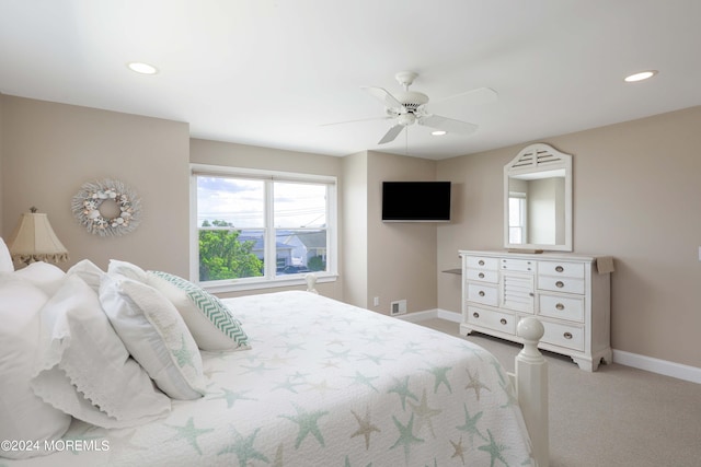 bedroom with light carpet, baseboards, a ceiling fan, and recessed lighting