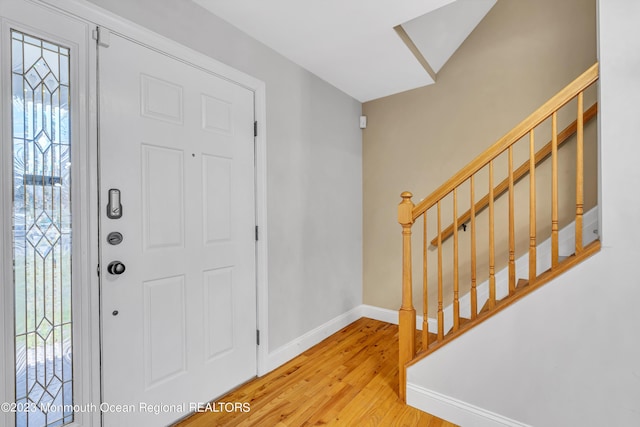 foyer entrance with light wood-type flooring