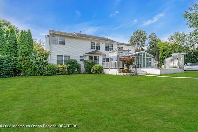 1969 Whitesville Rd, Toms River, NJ 08755 - back of house with a sunroom and a yard