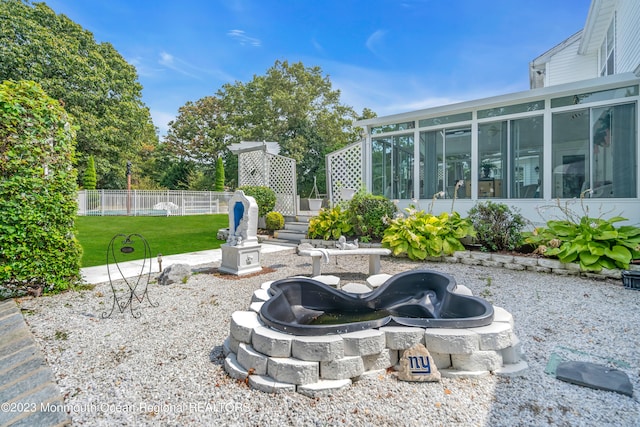 1969 Whitesville Rd, Toms River, NJ 08755 - view of yard featuring a sunroom and an outdoor fire pit