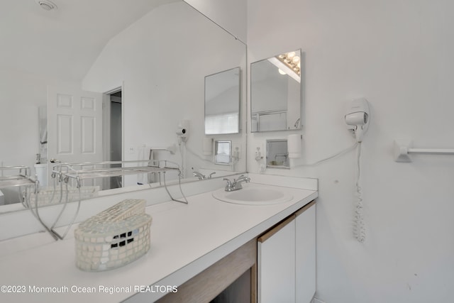 1969 Whitesville Rd, Toms River, NJ 08755 - bathroom featuring vanity and lofted ceiling
