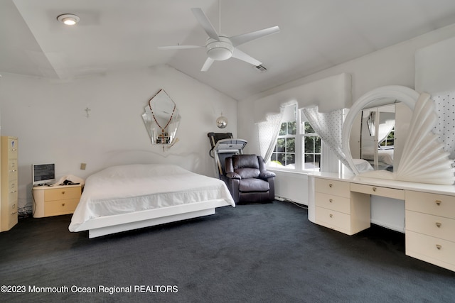 1969 Whitesville Rd, Toms River, NJ 08755 - bedroom with lofted ceiling, dark carpet, and ceiling fan