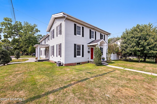 view of front of home with a front lawn