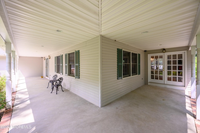 view of patio / terrace featuring french doors and covered porch