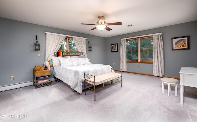 bedroom with a baseboard radiator, baseboards, a ceiling fan, and light colored carpet