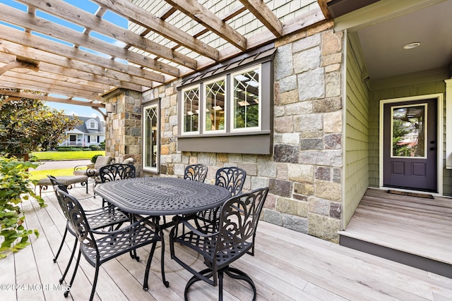 wooden deck featuring a pergola