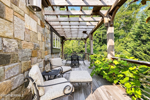 wooden deck with a pergola