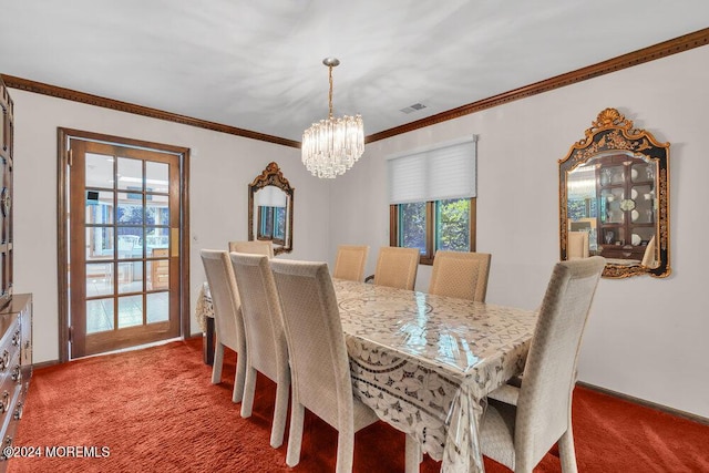 dining area featuring an inviting chandelier, carpet, baseboards, visible vents, and ornamental molding