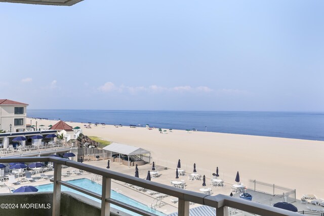 view of water feature with a beach view