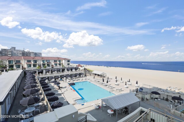 view of water feature with a beach view