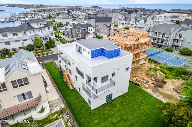 bird's eye view with a water view