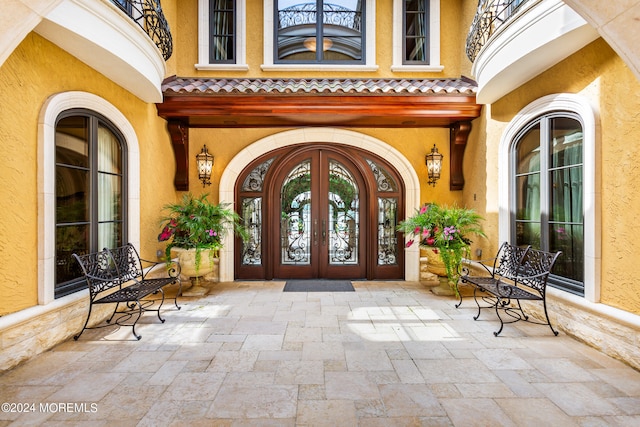 doorway to property with french doors