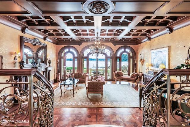 living room with beamed ceiling, parquet floors, coffered ceiling, and a chandelier