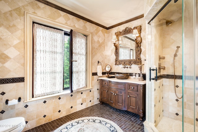 bathroom featuring tile patterned flooring, toilet, a wealth of natural light, and vanity