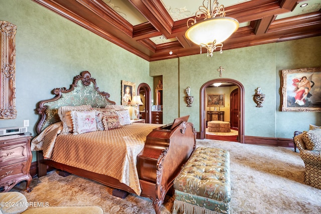 carpeted bedroom with a chandelier, coffered ceiling, a high ceiling, crown molding, and beamed ceiling