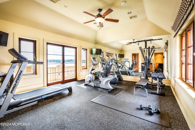 gym featuring ceiling fan and high vaulted ceiling