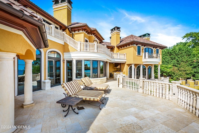 view of patio with a balcony