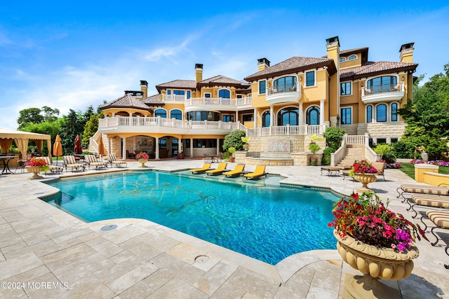 view of pool with a patio