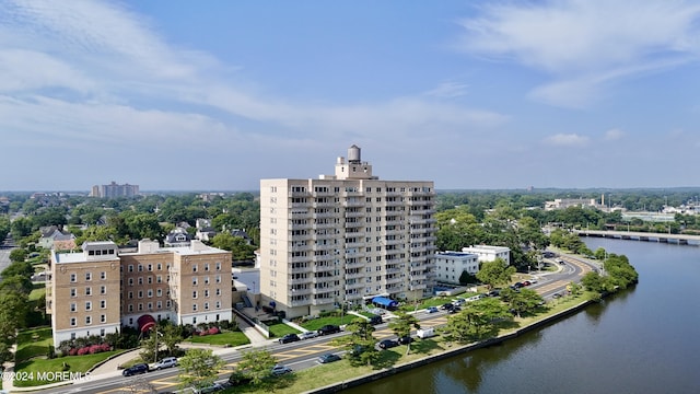 bird's eye view with a water view and a city view